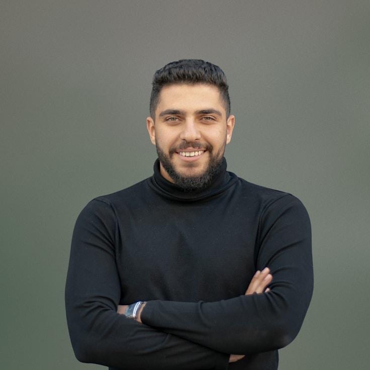 Milan Rivera, Client Relations Director, discussing corporate gifting strategy with business clients